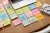 depositphotos_213010566-stock-photo-high-angle-view-paper-stickers