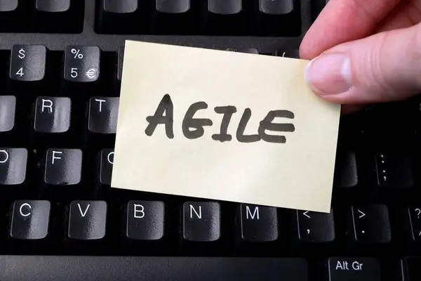 depositphotos_690488042-stock-photo-laptop-keyboard-hand-puts-paper